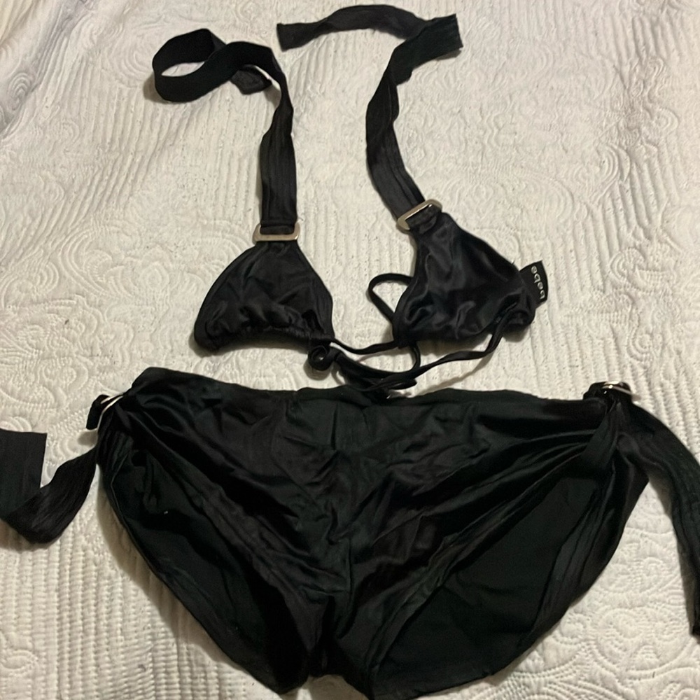 Black BEBE bathing suit.